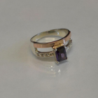 Срібна каблучка з накладками з золота