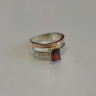 Срібна каблучка з накладками з золота