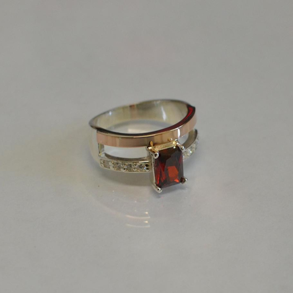 Срібна каблучка з накладками з золота