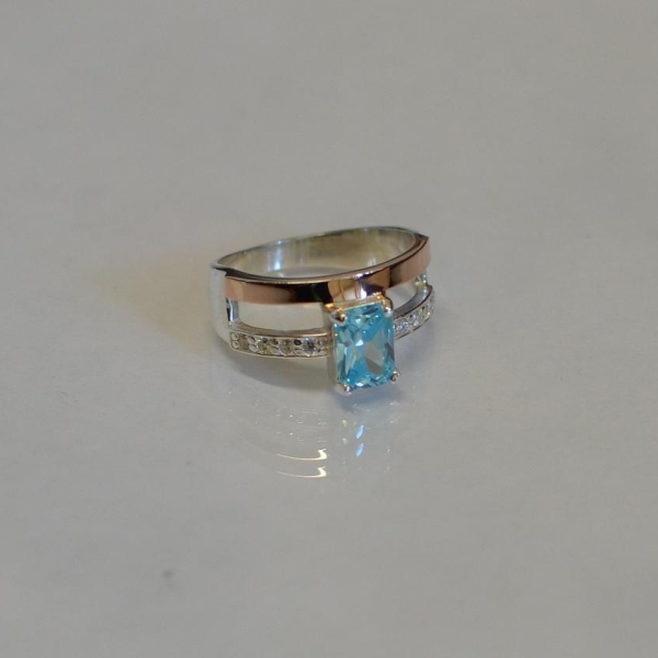 Срібна каблучка з накладками з золота