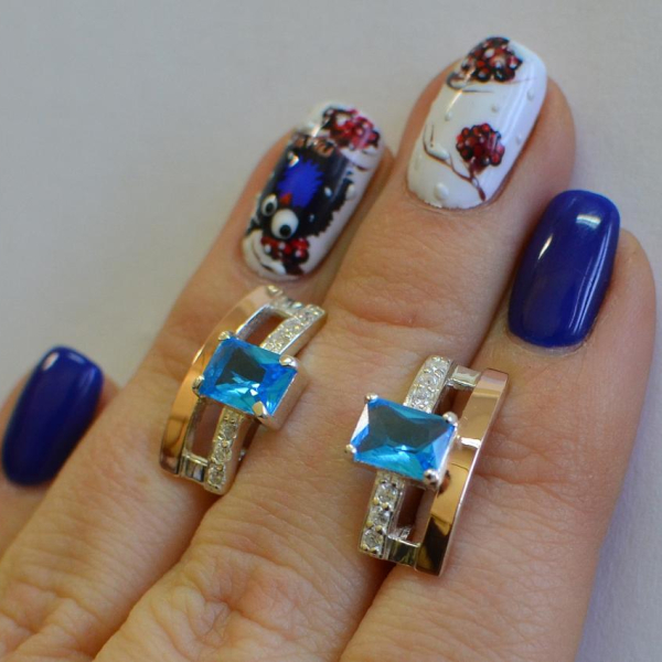 Срібні сережки з золотими пластинами