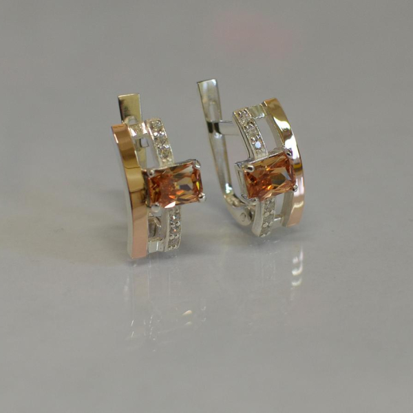 Срібні сережки з золотими пластинами