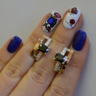 Срібні сережки з золотими пластинами