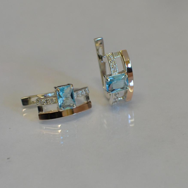 Срібні сережки з золотими пластинами