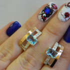 Срібні сережки з золотими пластинами