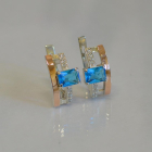 Срібні сережки з золотими пластинами