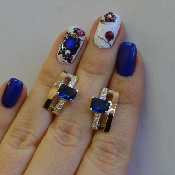 Срібні сережки з золотими пластинами