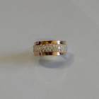 Срібна каблучка з золотими напайками