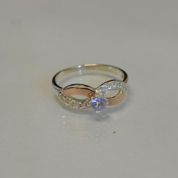 Срібна каблучка з золотими накладками