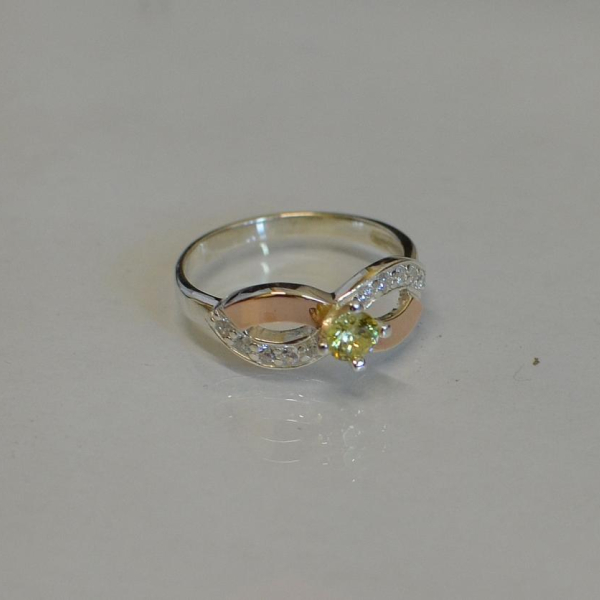 Срібна каблучка з золотими накладками