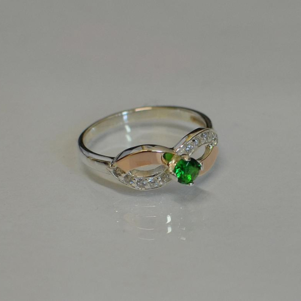 Срібна каблучка з золотими накладками