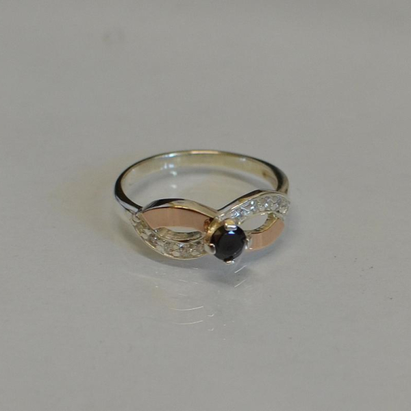 Срібна каблучка з золотими накладками