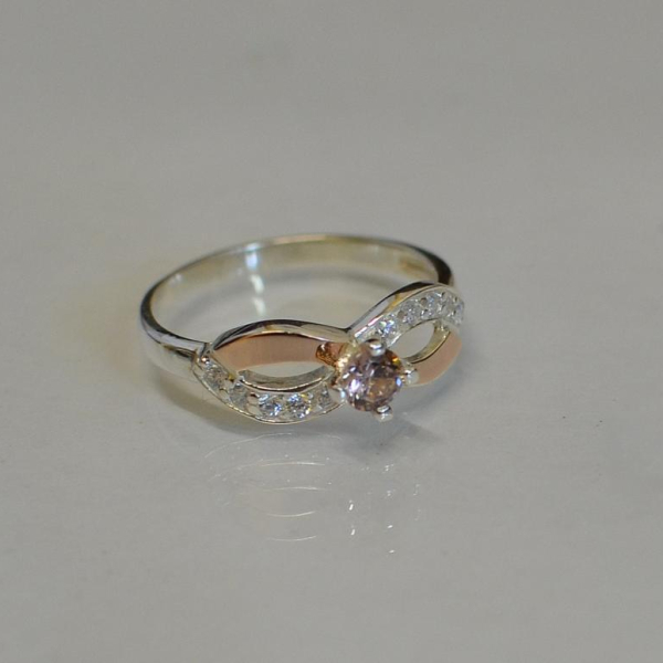 Срібна каблучка з золотими накладками