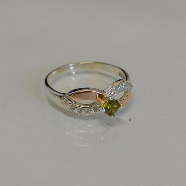 Срібна каблучка з золотими накладками