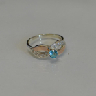 Срібна каблучка з золотими накладками