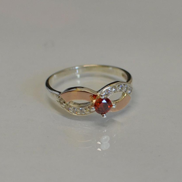 Срібна каблучка з золотими накладками