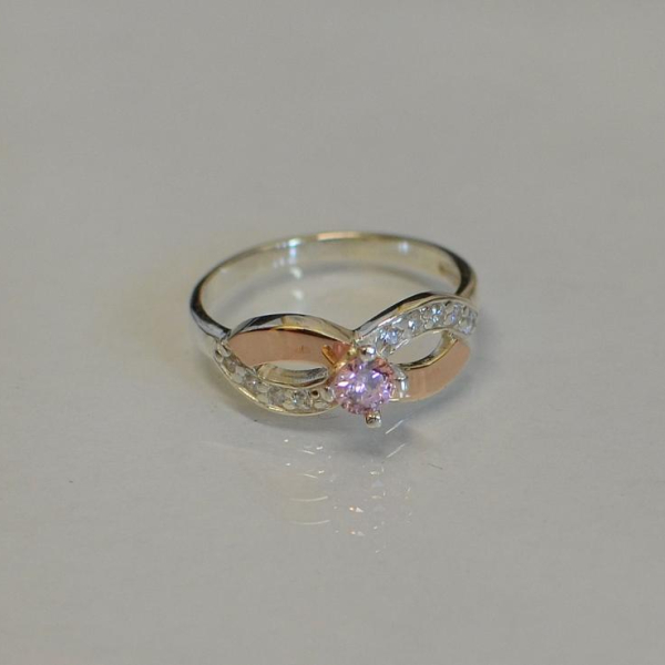 Срібна каблучка з золотими накладками