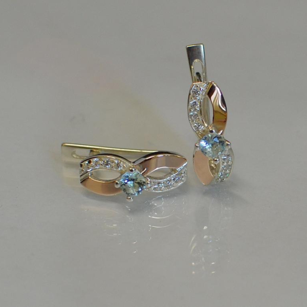 Срібні сережки з золотими пластинами