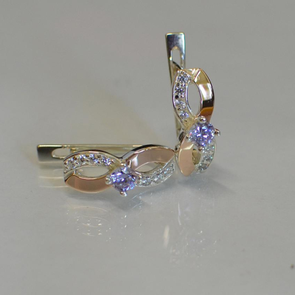 Срібні сережки з золотими пластинами