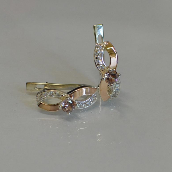 Срібні сережки з золотими пластинами