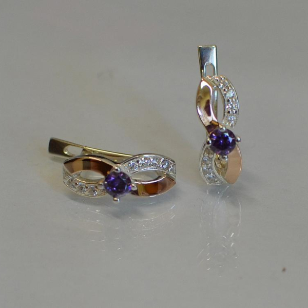 Срібні сережки з золотими пластинами