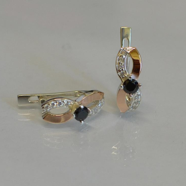 Срібні сережки з золотими пластинами