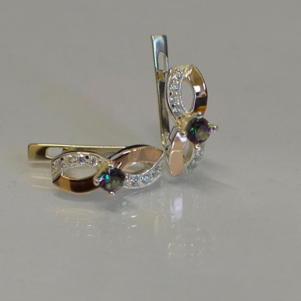 Срібні сережки з золотими пластинами