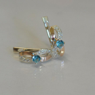 Срібні сережки з золотими пластинами