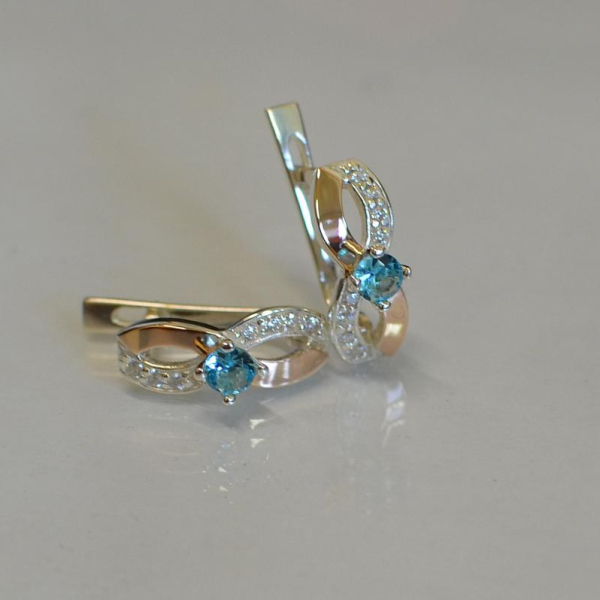 Срібні сережки з золотими пластинами