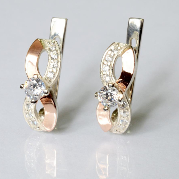 Срібні сережки з золотими пластинами