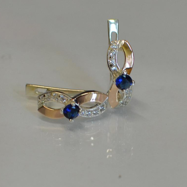 Срібні сережки з золотими пластинами