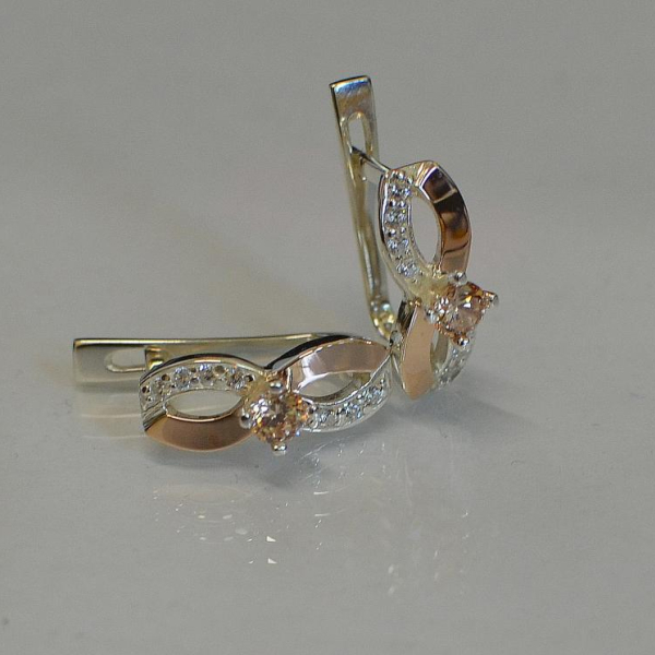 Срібні сережки з золотими пластинами