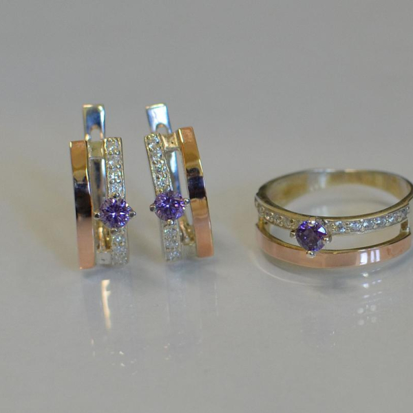 Срібний набір з золотими вставками