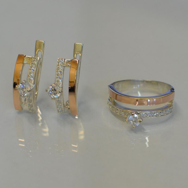 Срібний набір з золотими вставками