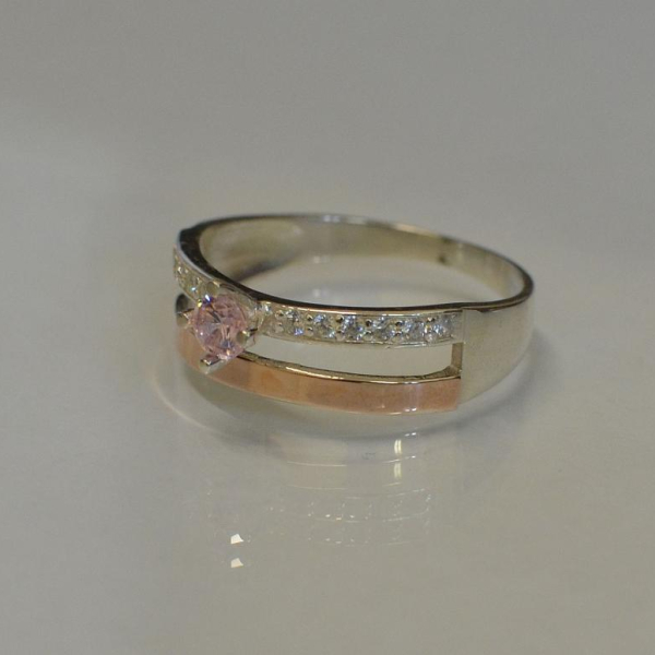 Срібна каблучка з накладками з золота