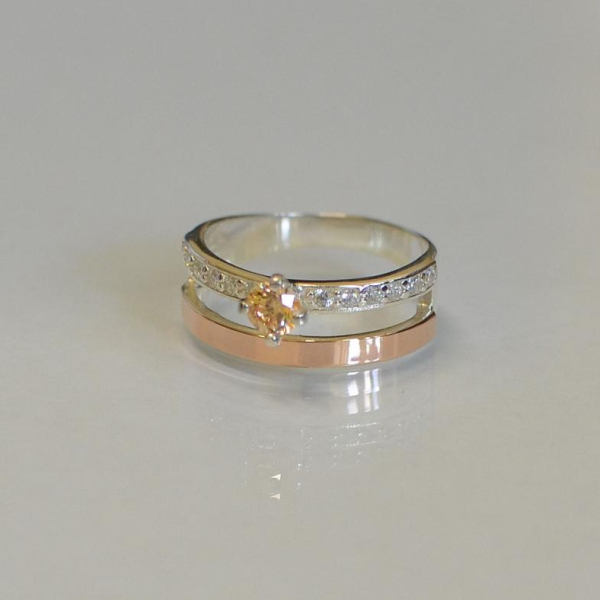 Срібна каблучка з накладками з золота