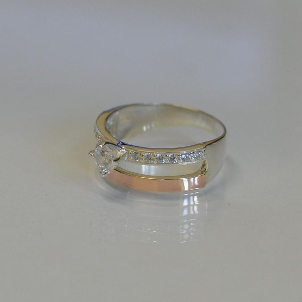 Срібна каблучка з накладками з золота