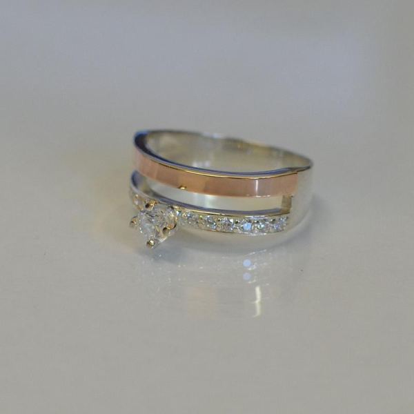 Срібна каблучка з накладками з золота