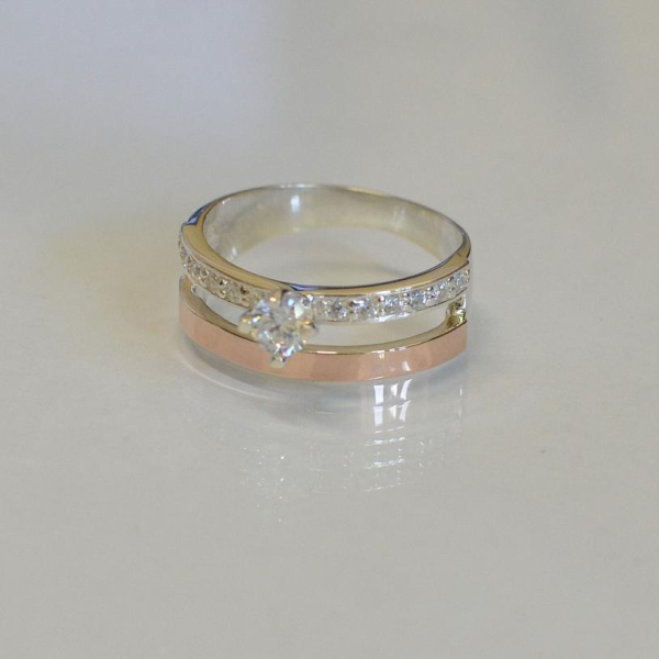 Срібна каблучка з накладками з золота