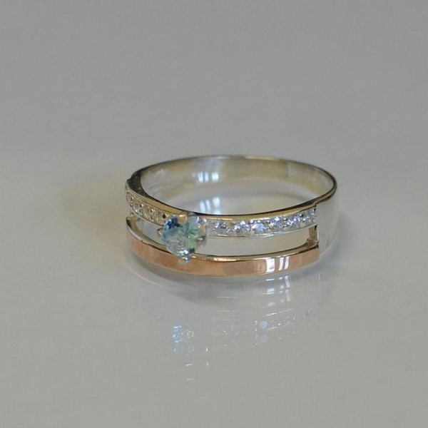 Срібна каблучка з накладками з золота