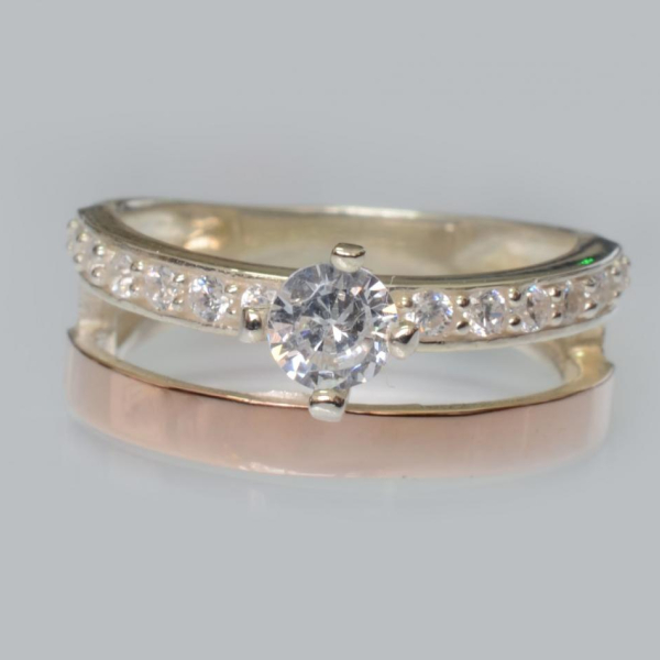 Срібна каблучка з накладками з золота