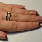 Срібна каблучка з накладками з золота