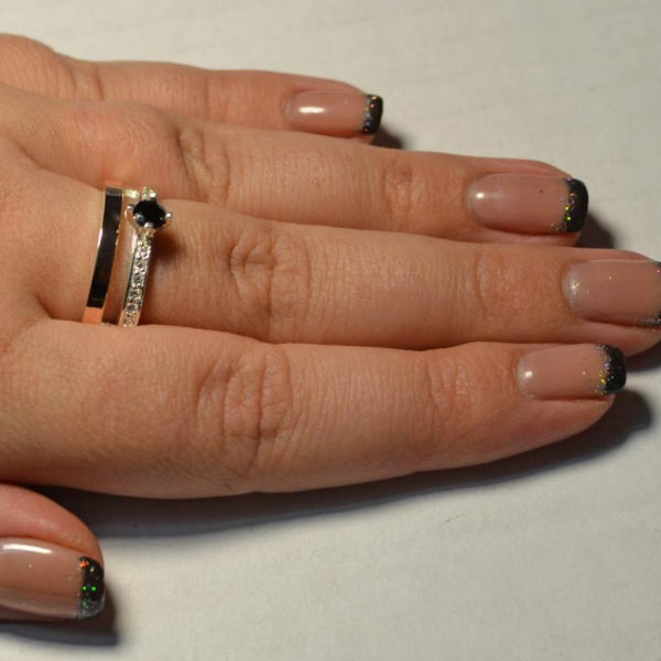 Срібна каблучка з накладками з золота