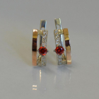 Срібні сережки з золотими накладками