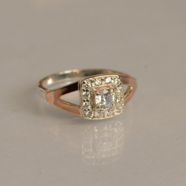 Срібна каблучка  зі вставками з золота