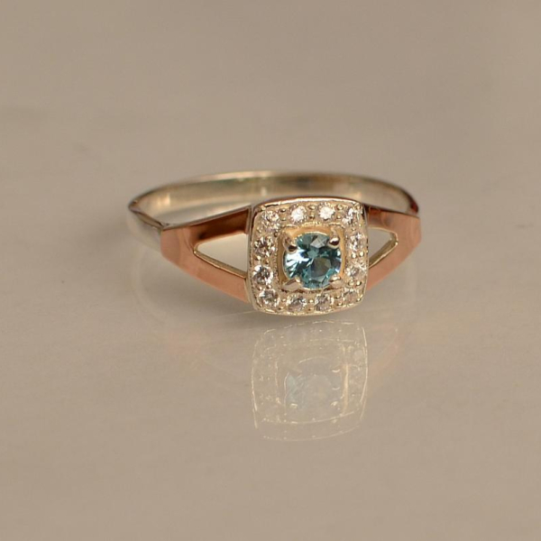 Срібна каблучка  зі вставками з золота