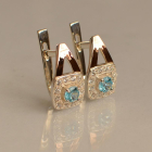 Срібні сережки з пластинами із золота