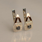 Срібні сережки з пластинами із золота