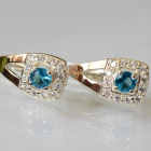 Срібні сережки з пластинами із золота