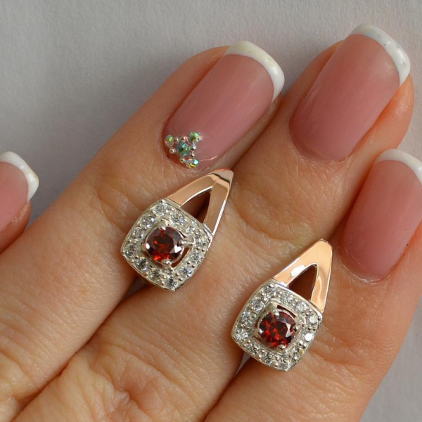 Срібні сережки з пластинами із золота